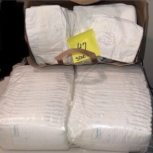 Pampers brand diapers total of 95 size 1